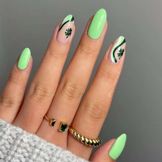 Soft pastel green nails with Shamrock details