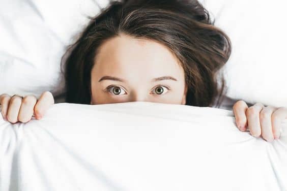a woman unable to sleep due to anxiety